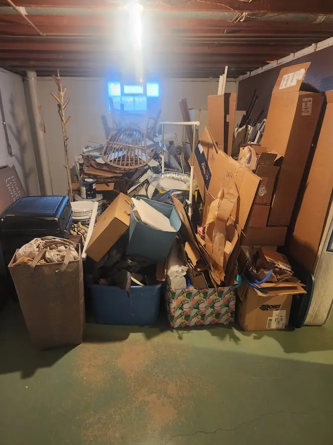 Roll-off dumpster container at job site for 2 Yard Dumpster Rental in Wesley Chapel